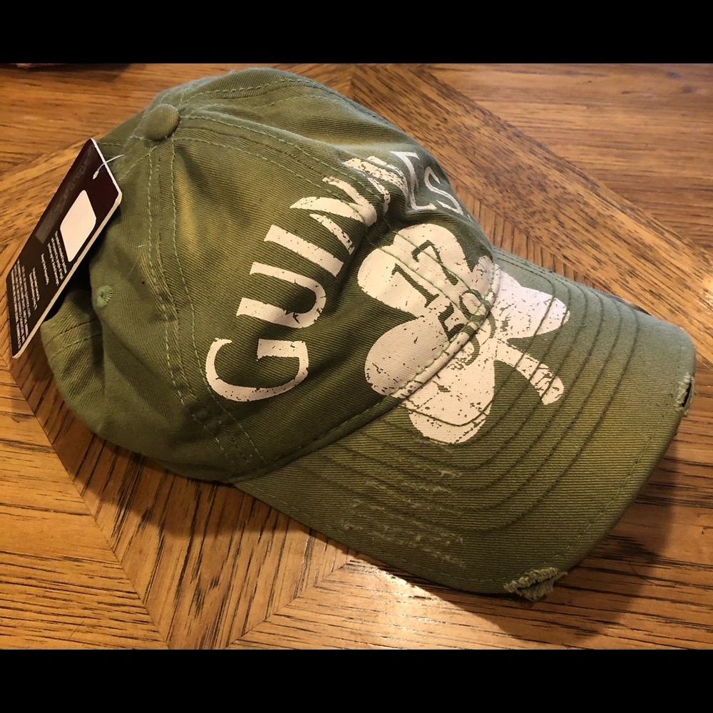 Guinness baseball cap with beer opener on top
